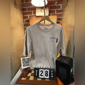 Hawgunners, Inc." logo and shooting target graphic on the back.